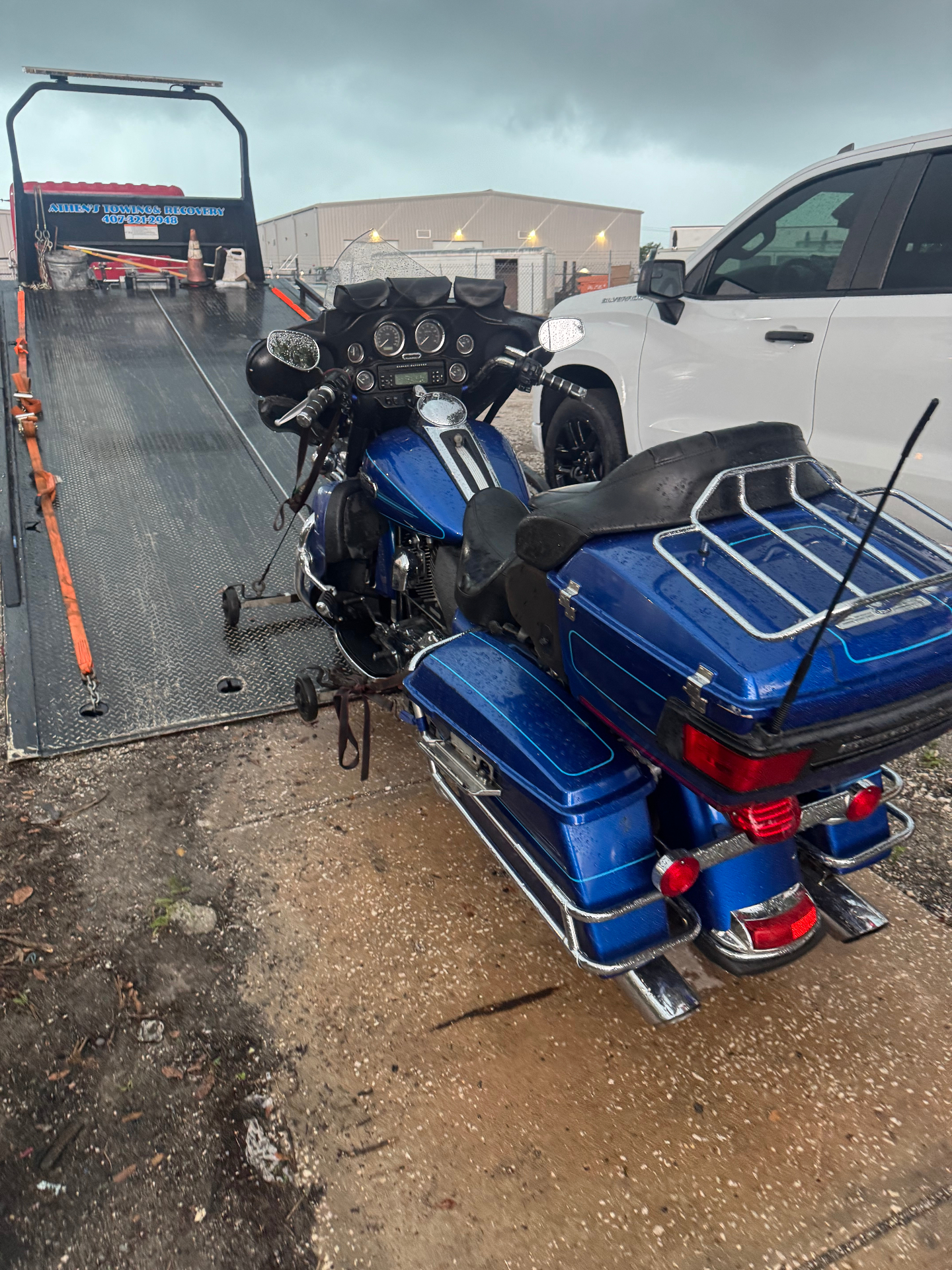 Motorcycle recovery operation in the rain